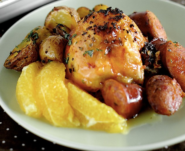 Delicious Spanish chicken complimented with fresh orange slices, potatoes and chorizo.